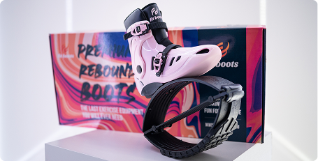 Pink and black exercise boot with a colorful box in the background